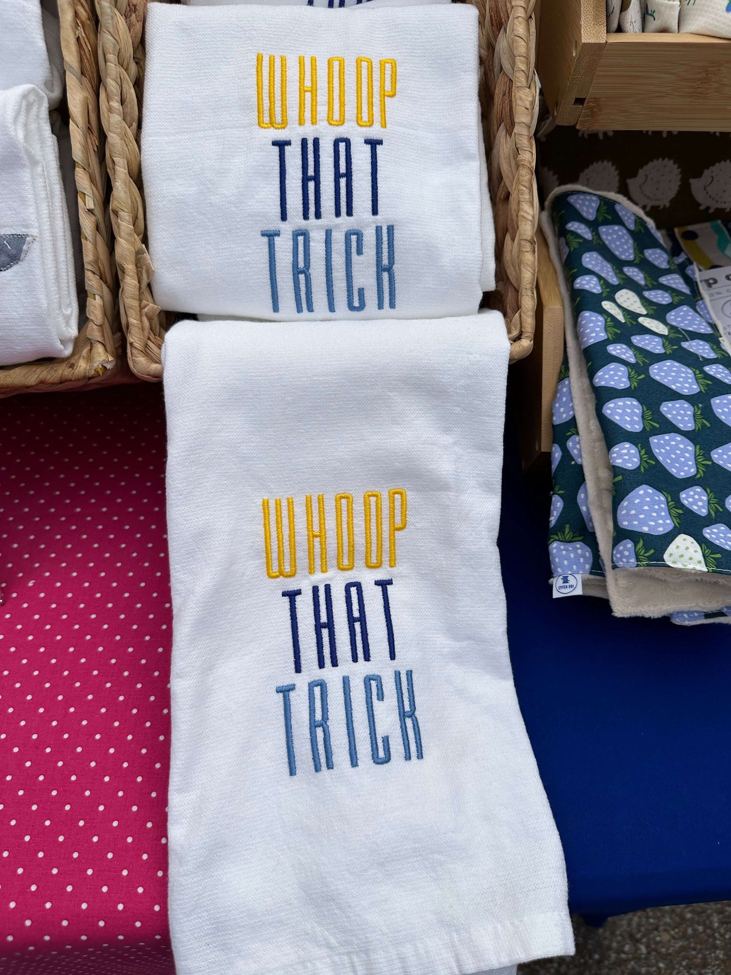 100% cotton tea towel featuring the memphis grizzlies rally phrase, “Whoop that trick” in grizzlies brand colors