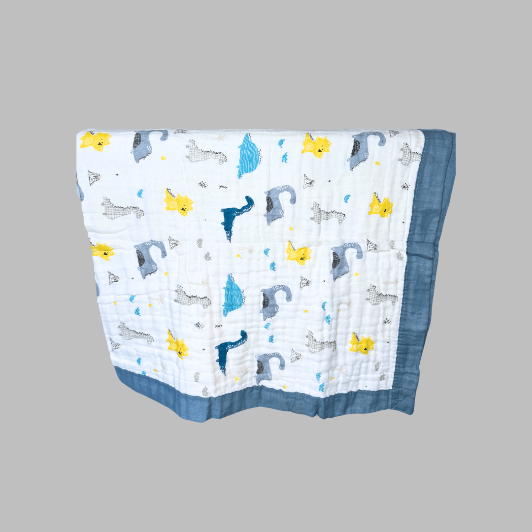 Muslin Cotton Baby Blanket featuring a cute Dinosaur Medley