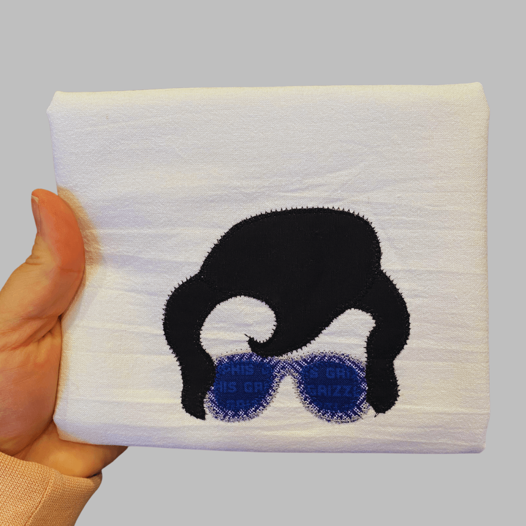 100% cotton tea towel featuring an elvis-inspired design