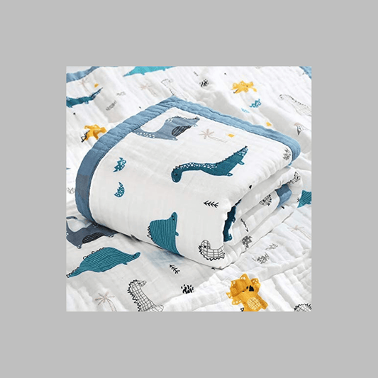 Muslin Cotton Baby Blanket featuring a cute Dinosaur Medley